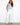 White and blue striped pants featuring a wide fit with slash pockets, perfect for casual wear by Charlie B.
