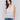 V-neck crochet vest with button detail by Charlie B.