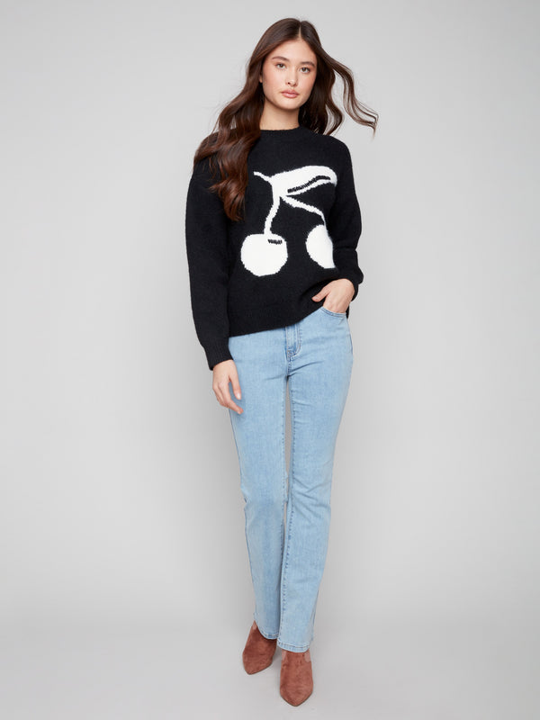 Stylish sweater featuring plush texture and delightful cherry pattern, ideal for any casual outing by Charlie B.