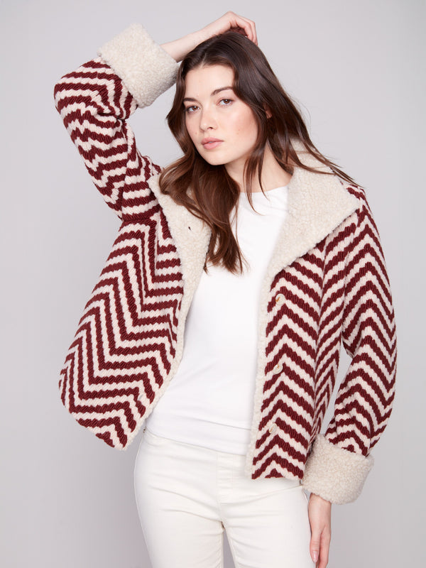 Chevron Boucle Jacket with button closure adds elegance, featuring cozy sherpa trim on collar and cuffs by Charlie B.