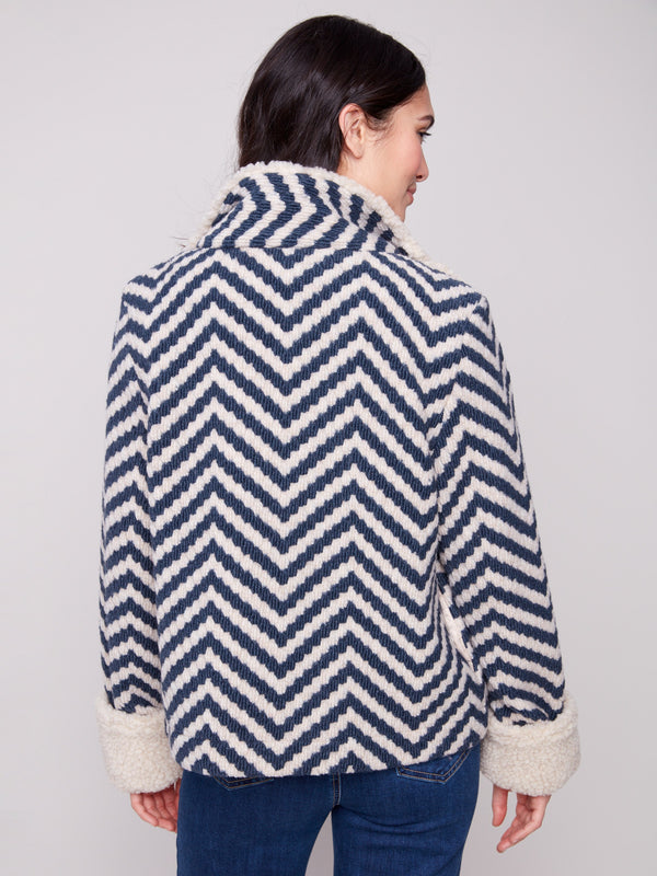 Navy Chevron Boucle Jacket featuring a luxurious bouclé chevron pattern that elevates your look by Charlie B.