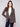 Stylish women's blazer showcasing intricate gold button details by Charlie B.