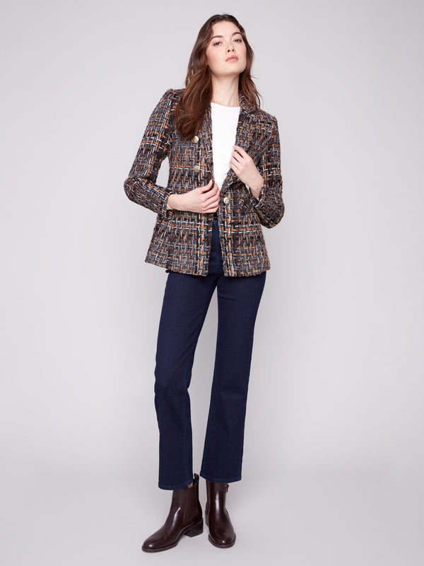 Blazer in luxurious chevron tweed, adorned with statement gold buttons by Charlie B.