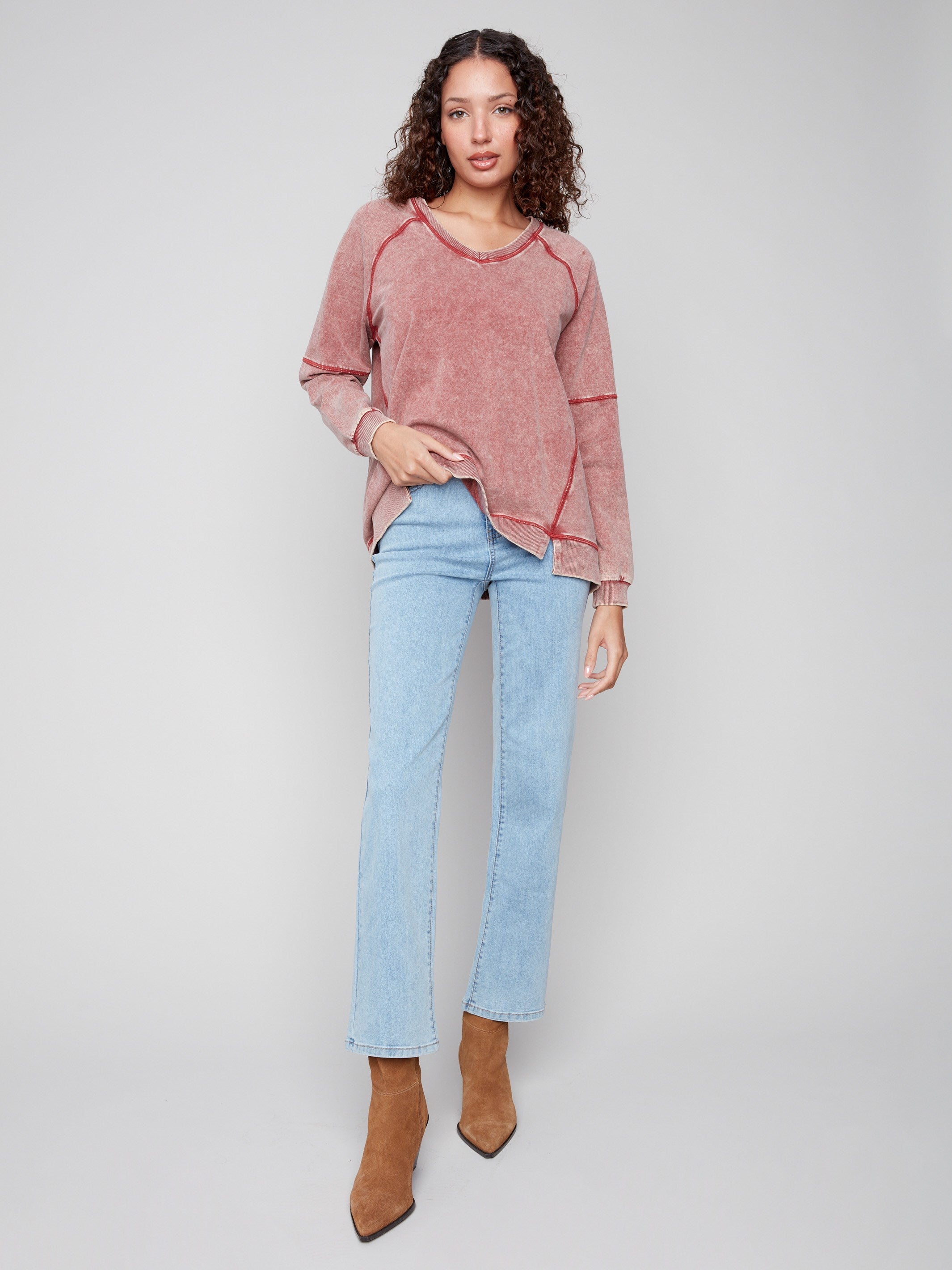 Featuring washed effect fabric, this Cabernet top offers a trendy and unique look by Charlie B.