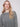 Pointelle design adds texture and depth to this spruce long-sleeve sweater, perfect for layering by Charlie B.