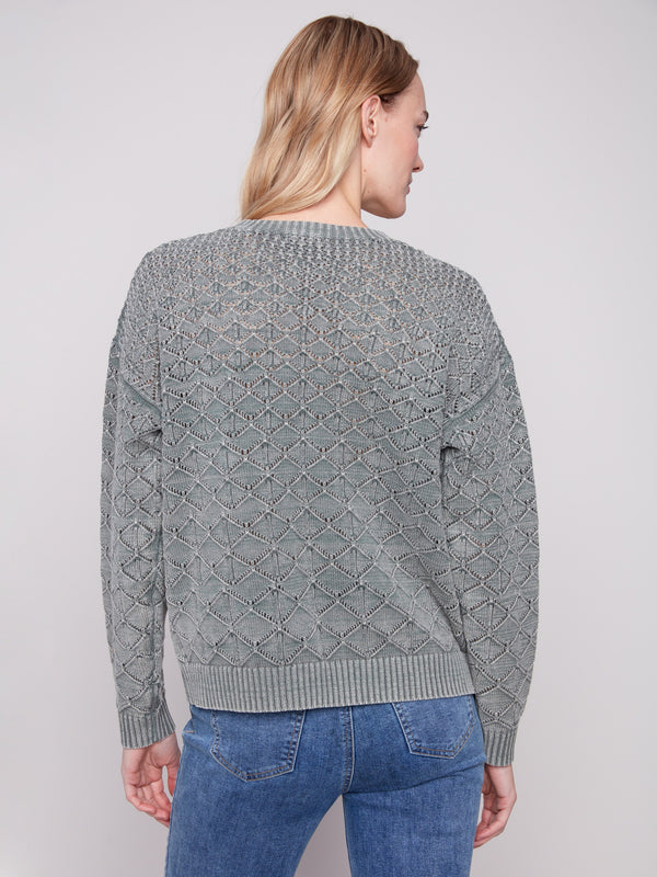 Intricate pointelle pattern enhances the visual appeal of this cozy spruce long-sleeve sweater by Charlie B.