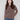 Mocha sweater with a pointelle design and drop shoulders, perfect for cozy days by Charlie B.