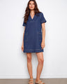 Denim dress featuring a stylish collared V-neck, perfect for any casual outing. Designed with comfort in mind by Charlie B.