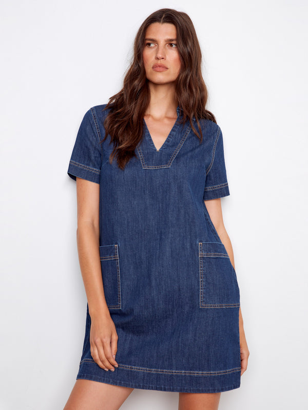 This knee-length denim dress offers a relaxed fit and is ideal for everyday wear. A versatile piece crafted by Charlie B.