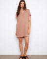 A stylish dress with a flattering collared V-neck, perfect for any occasion. The relaxed fit ensures comfort and elegance by Charlie B.