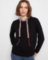 Black sweater with a hood featuring drawstrings and contrasting pocket details, crafted from 100% cotton by Charlie B.