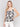 Black and cream crochet top with a square neckline, designed by Charlie B.