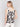 Elegant sleeveless crochet top with a scalloped hem, crafted by Charlie B.