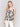 Chic floral patterned crochet top featuring intricate details, made by Charlie B.