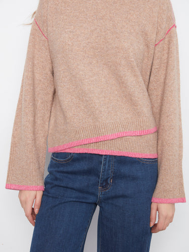 With drop shoulders, this sweater offers a comfortable fit and effortless style for any casual outing. By Charlie B.