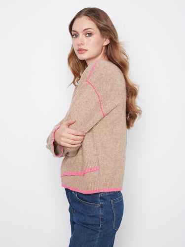 Wide sleeves give this sweater an airy feel, making it ideal for layering in cooler weather. By Charlie B.