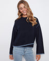 Sweater with a classic crew neckline, paired effortlessly with light denim jeans. A timeless choice for casual elegance by Charlie B.