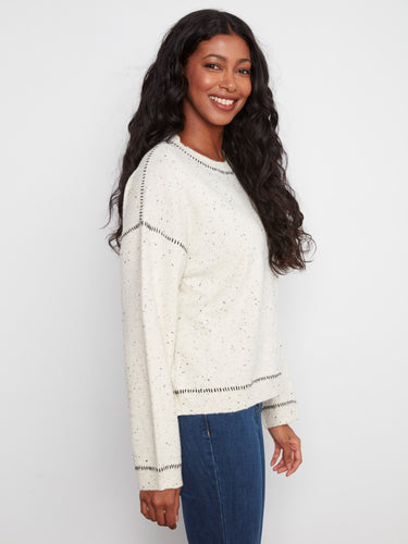 The relaxed fit of this speckled sweater ensures all-day comfort and casual flair by Charlie B.