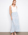 Convertible floral piece in light blue, showcasing its midi length and stylish versatility by Charlie B.