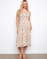 Designed to be worn as a skirt or dress, this garment provides flexibility and elegance. By Charlie B.