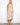 Designed to be worn as a skirt or dress, this garment provides flexibility and elegance. By Charlie B.