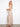 Experience the elegance of midi length in this beautifully designed outfit that suits all occasions. By Charlie B.