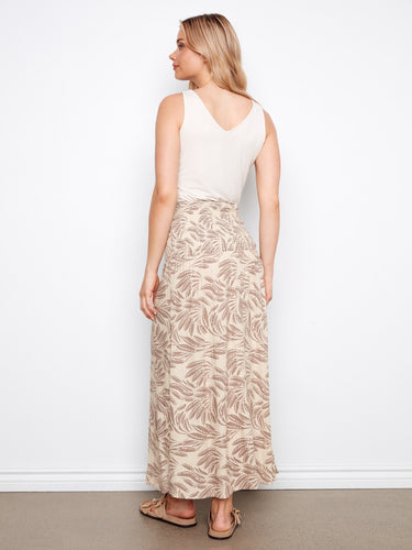 Enjoy the freedom of removable straps that enhance the versatility of your wardrobe staple. By Charlie B.