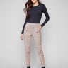 Almond corduroy jogger pants featuring a slim fit and elastic waistband for a comfortable style by Charlie B.