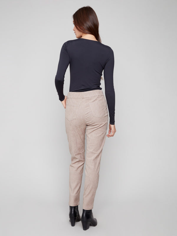 Stylish almond joggers with two back pockets, combining fashion and functionality effortlessly by Charlie B.