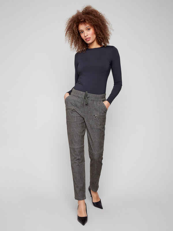 Corduroy jogger pants featuring a slim fit and elastic waistband with drawstrings for ultimate comfort by Charlie B.