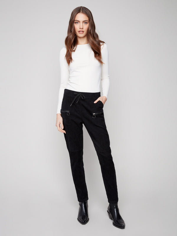 Slim fit black corduroy joggers with zipper pockets and elastic waistband for a comfortable style by Charlie B.
