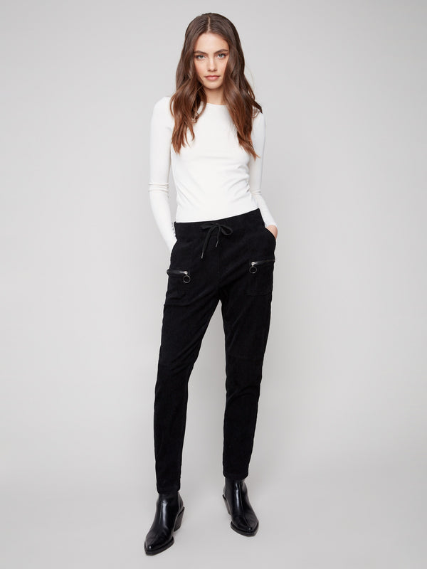 Elastic waistband joggers in black corduroy with back pockets, blending comfort and utility effortlessly by Charlie B.