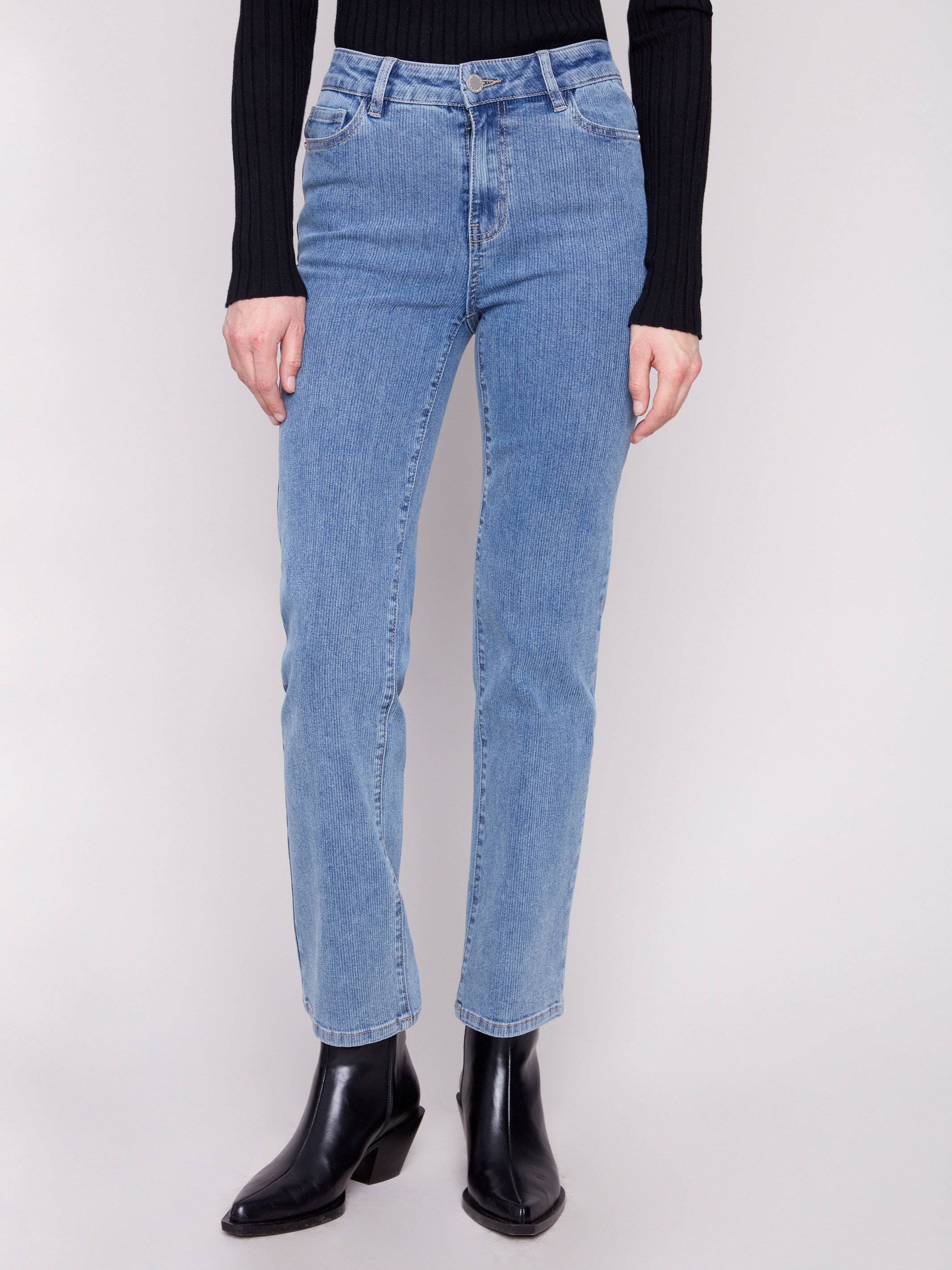These pants feature a classic five-pocket design in stretch corduroy denim for added comfort by Charlie B.
