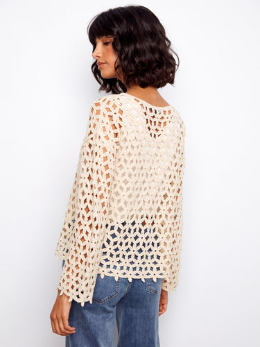 The open weave pattern adds texture to this classic design, making it stand out in any setting by Charlie B.