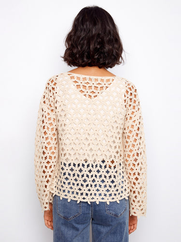 A timeless piece that pairs well with jeans or skirts, offering endless styling possibilities for day or night looks by Charlie B.