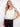 Chic sleeveless top featuring intricate contrast edges for a modern look. By Charlie B.