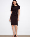 Elegant dress with a boat neckline, perfect for any occasion. The design is both sophisticated and timeless by Charlie B.