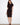 Elegant dress with a boat neckline, perfect for any occasion. The design is both sophisticated and timeless by Charlie B.