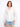 White shirt with a classic button-front closure, designed in 100% cotton for comfort and style by Charlie B.