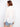 Fashionable white button-up shirt offering timeless appeal and breathable cotton construction by Charlie B.
