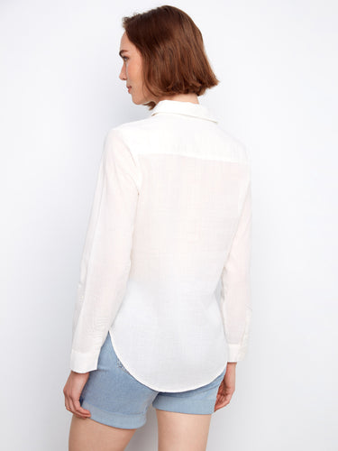 Fashionable white button-up shirt offering timeless appeal and breathable cotton construction by Charlie B.