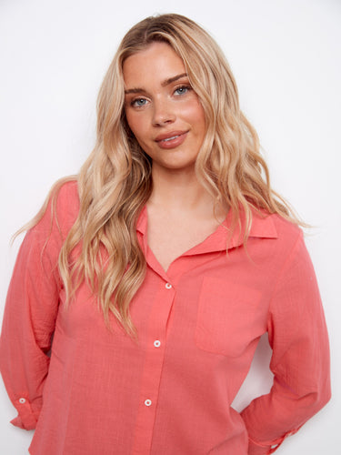 The adjustable roll-up sleeves offer flexibility and style, making it ideal for any occasion. Soft cotton fabric by Charlie B.