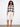 Chic crochet top showcasing a floral design and stylish boat neckline by Charlie B.