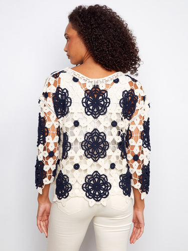 Stylish floral pattern on this navy crochet top, crafted with detailed design by Charlie B.