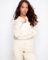 Natural cotton crochet hoodie sweater with a charming hooded design, featuring intricate open-knit patterns by Charlie B.