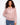 Pink crochet sweater featuring a hooded design and intricate patterns, perfect for casual wear. Made from 100% cotton by Charlie B.