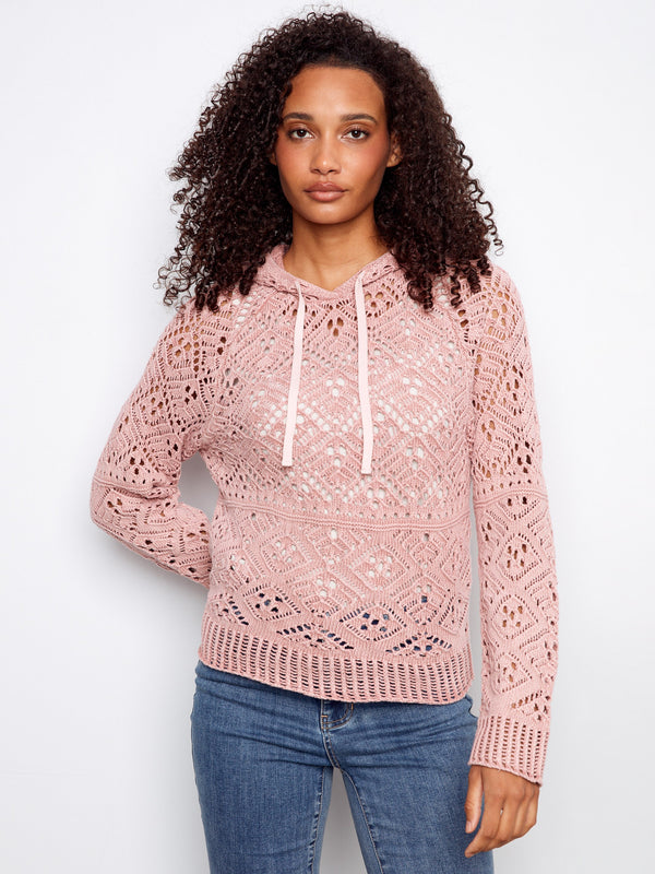 Pink crochet sweater featuring a hooded design and intricate patterns, perfect for casual wear. Made from 100% cotton by Charlie B.