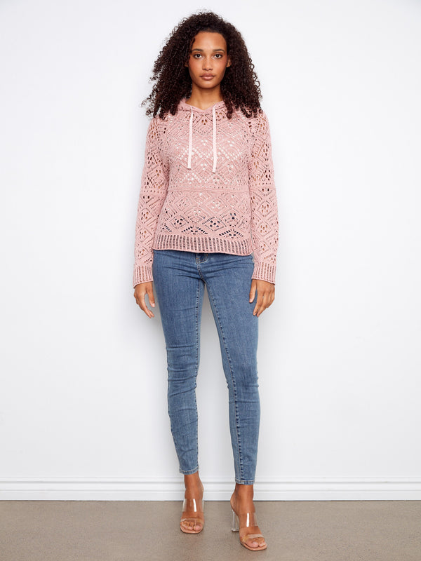 Stylish pink crochet sweater with adjustable drawstrings, offering comfort and versatility. Crafted from pure cotton by Charlie B.