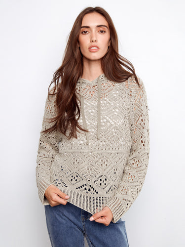 Designed with raglan sleeves, this sweater offers both style and freedom of movement in its delicate knit fabric. By Charlie B.
