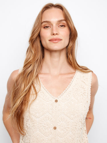 Chic knee-length crochet dress in fog hue with faux front buttons, adding a stylish touch to the ensemble by Charlie B.